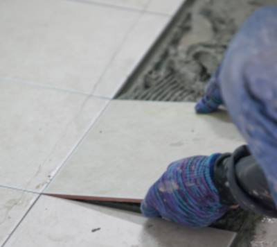 Tile floor installation by Elite Restorations